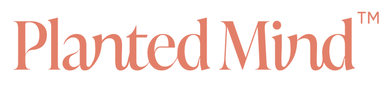 Logo of 'Planted Mind' with a peach-colored text on a white background